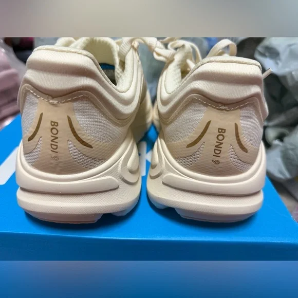 Hoka Women's Cream and Gold Bondi 9 Athletic Shoes - Picture 2 of 9